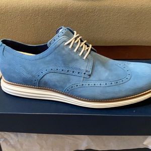 Men’s suede wing tip dress shoe